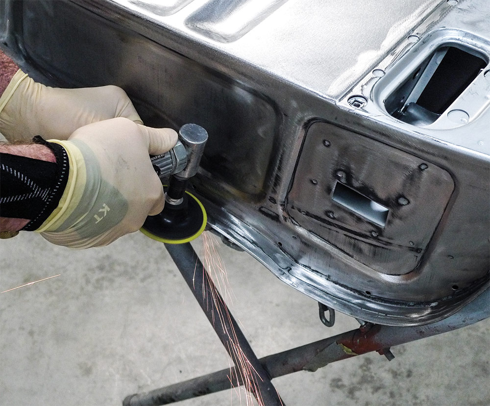 Grinding down plug welds