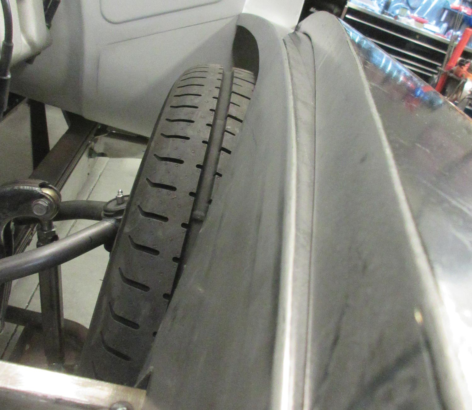view along the fender area above the tire, the panel sits in place