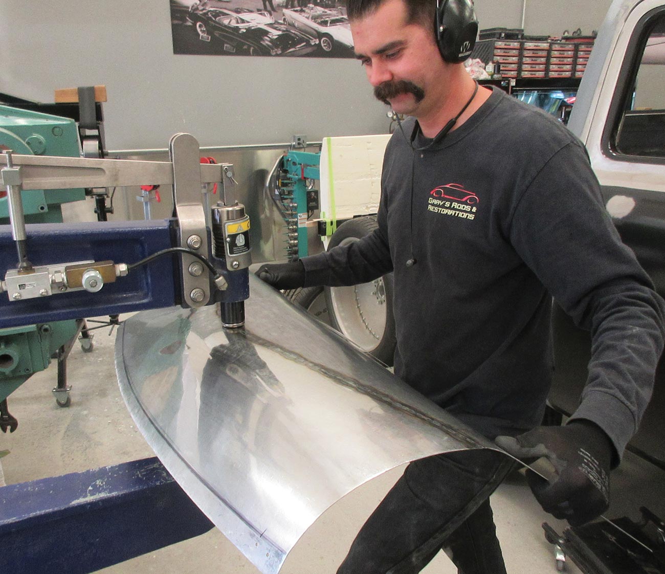 after finish welding, the mechanic smooths the welded area with a pneumatic planishing hammer