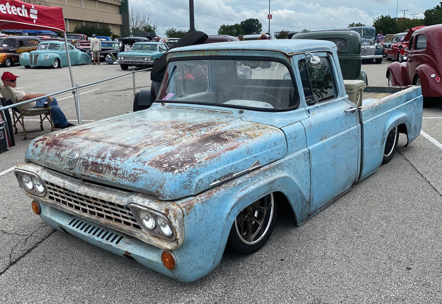 Rusted blue pickup truck