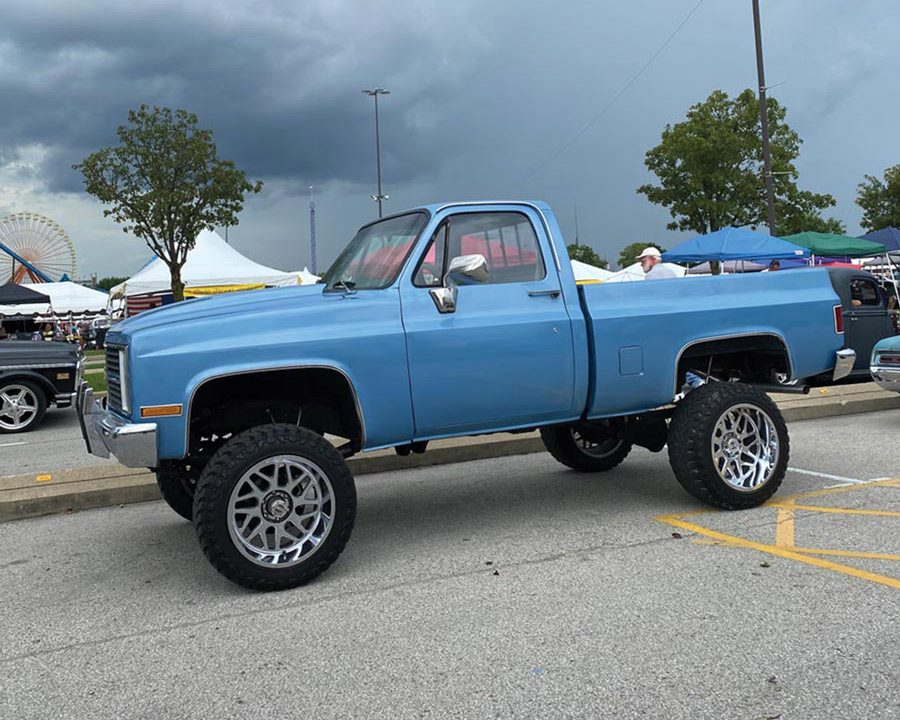 lifted classic blue pickup truck