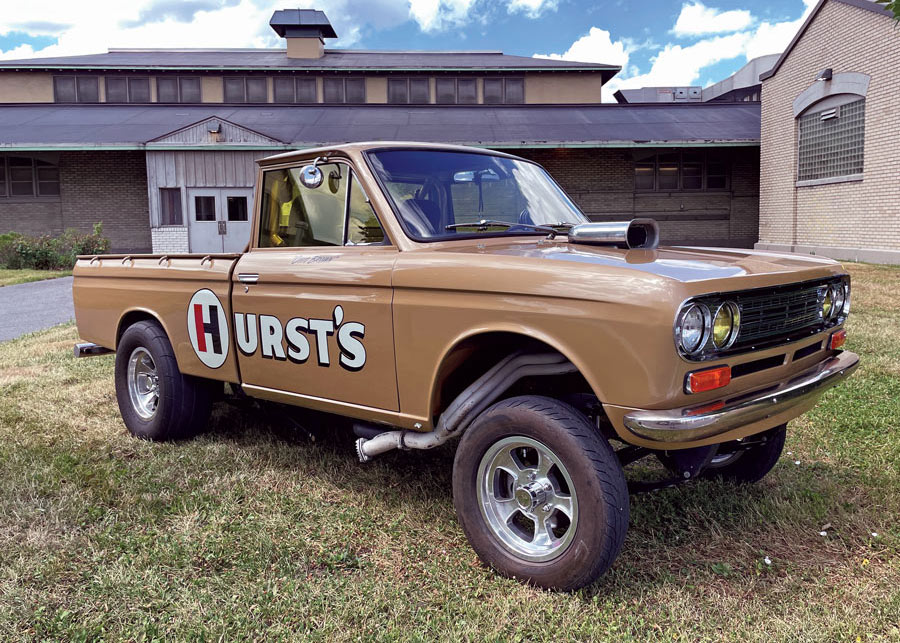 Brown classic pickup truck with "Hurt's" written on the side