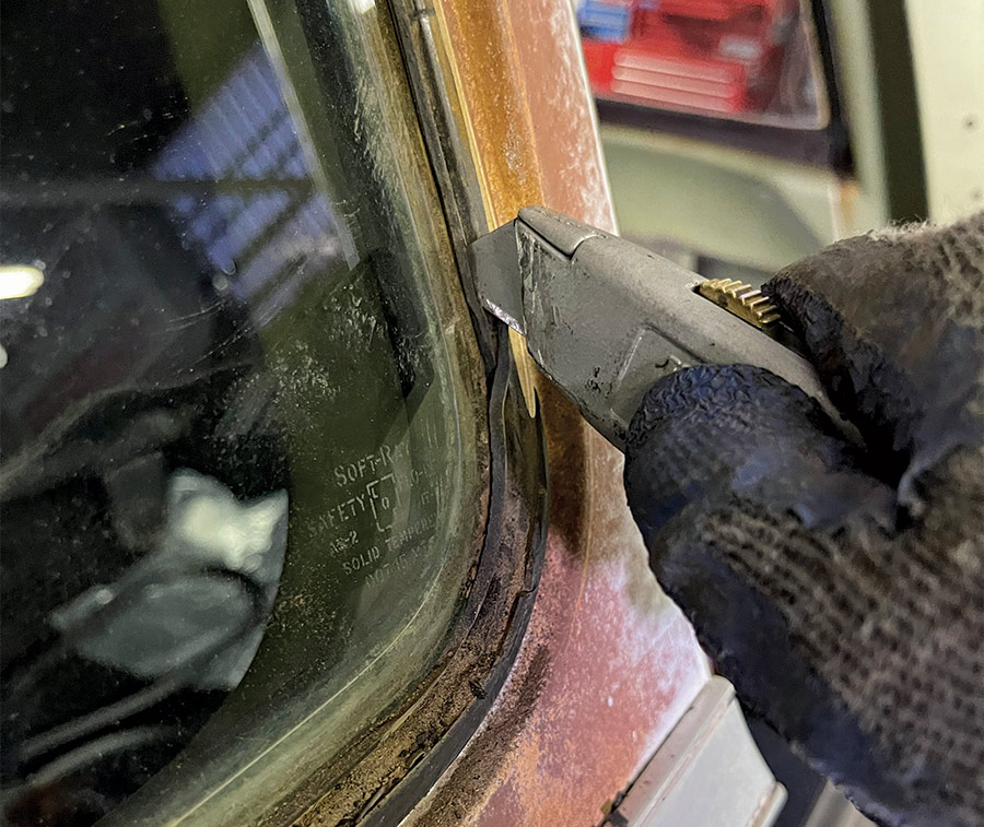 Box cutter cutting at glass seals