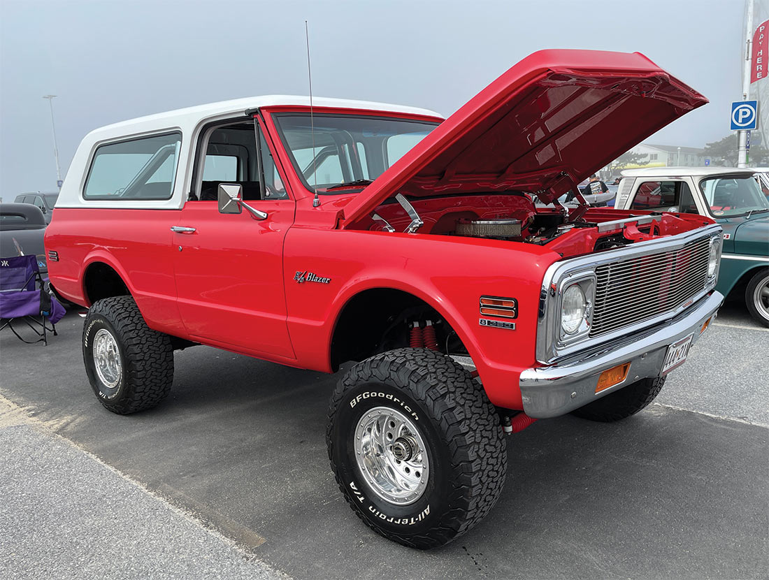 Lifted red K5 Blazer with white roof