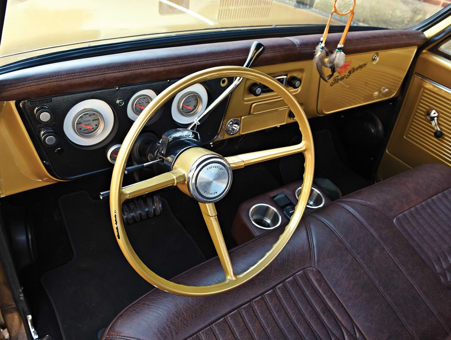 the '68 C10's gold steering wheel and dashboard