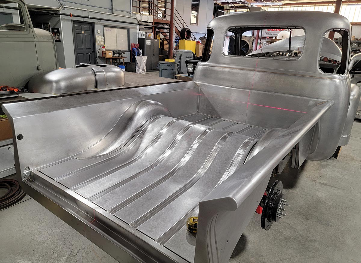 Brushed metal truck body and new custom bed floor