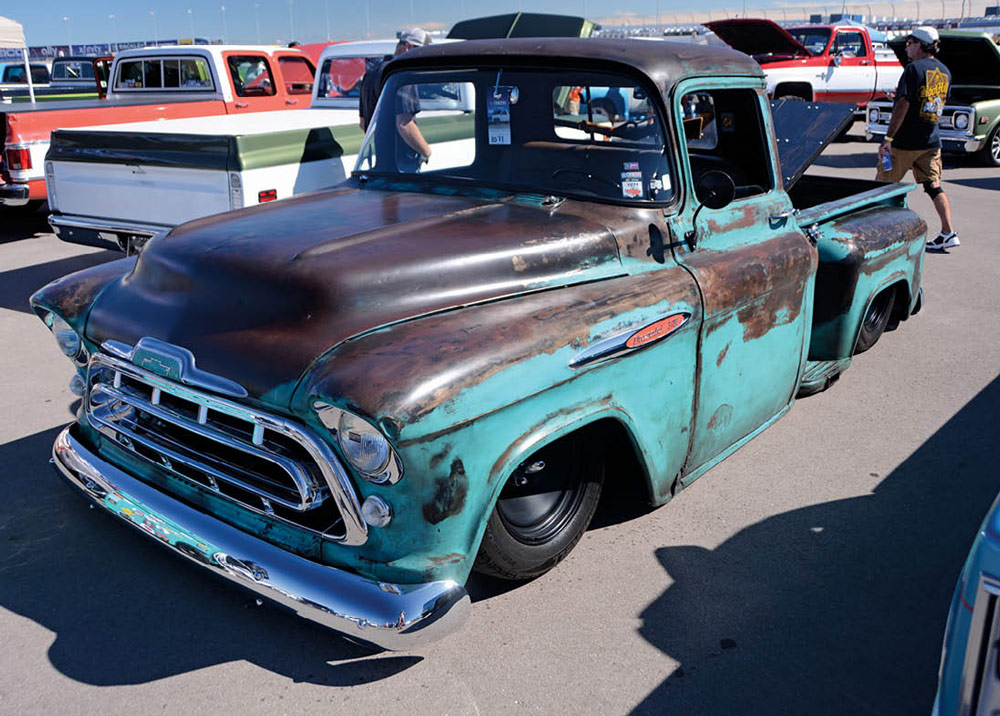 teal truck with paint coming off