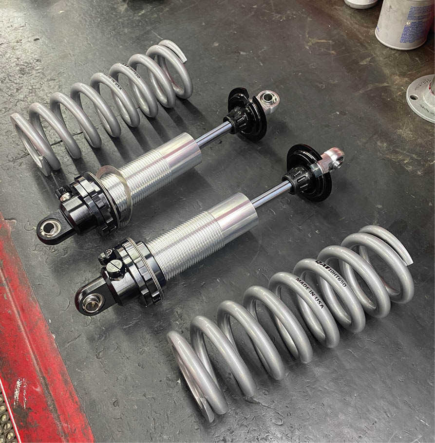 QA1 dual-adjustable shocks with 650-pound coilover springs