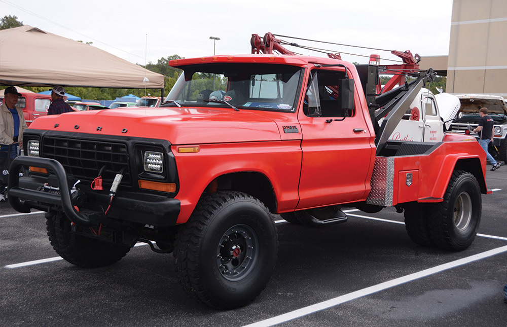 Red and black lifted 6th gen F100 wrecker