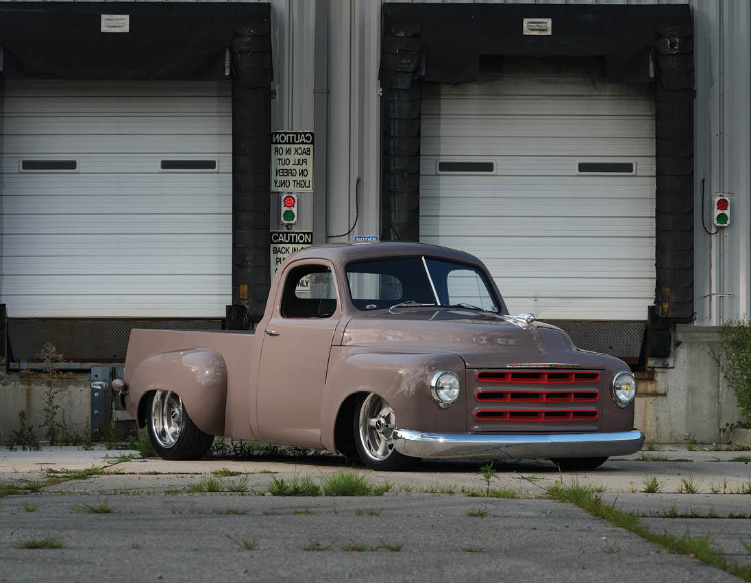 brown '50 Studebaker in front of garage