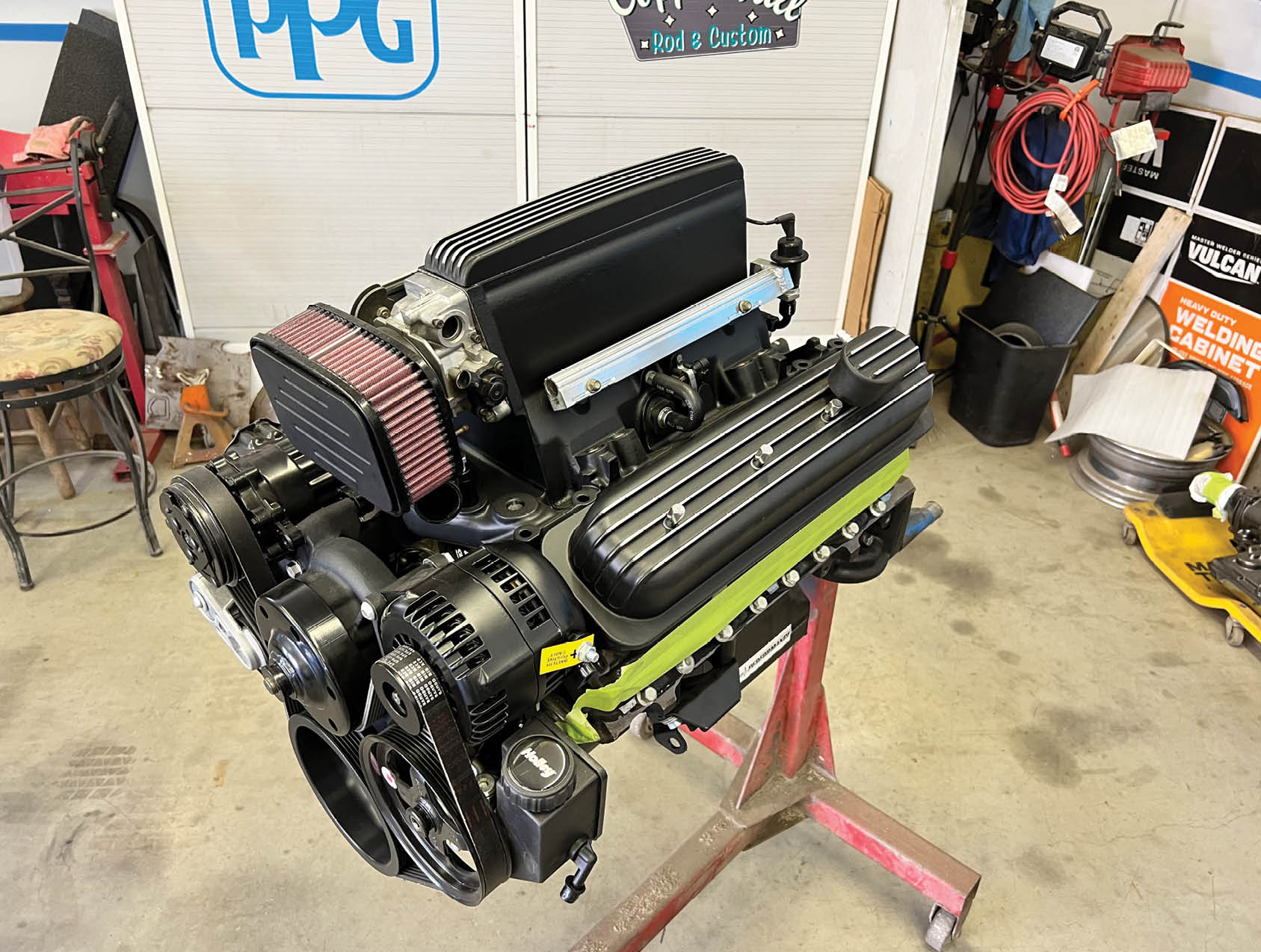 Sinon chose an unusual engine for his truck. It’s a circle track race engine for factory stock classes—it’s been topped with Chevrolet Performance Ram Jet fuel injection.