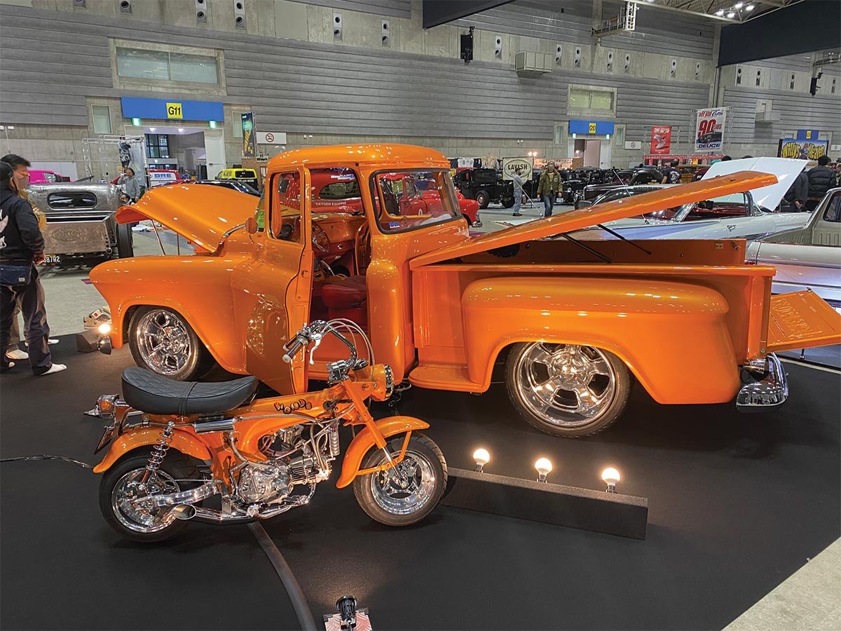 Metallic orange Chevy Apache with custom matching Honda Monkey