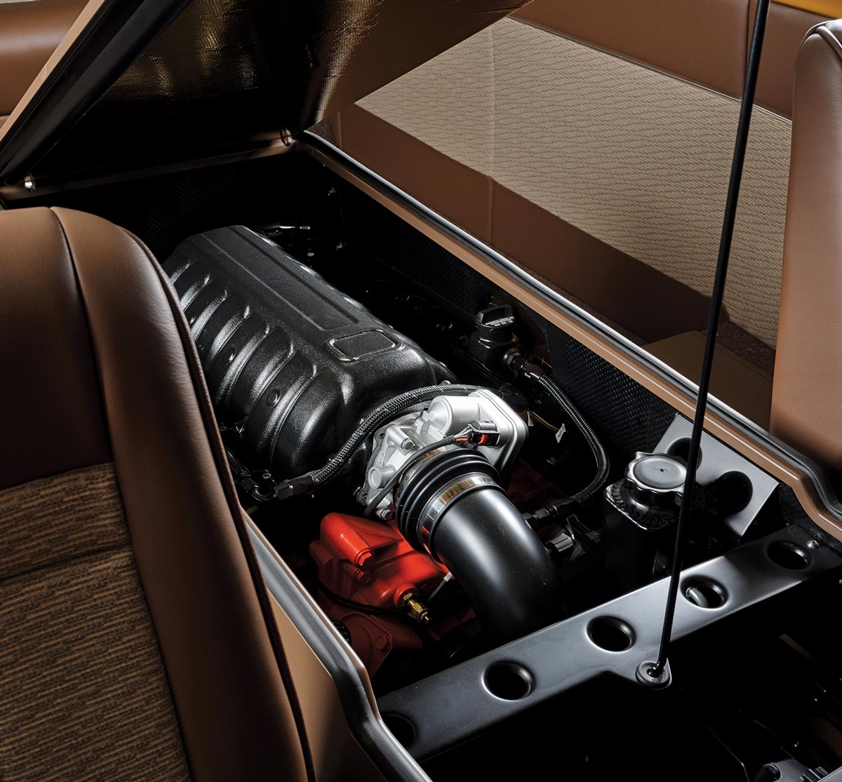 an open compartment showing a custom component in the '69 Dodge A108