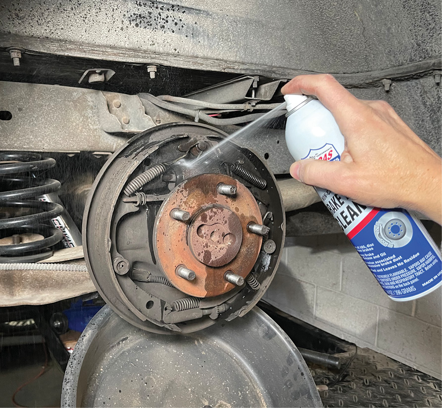 Start with a good bath with a quality brake cleaner. This will get rid of all the lining dust that will instantly turn your hands black. The cool thing about brake cleaner is that it dries within minutes and leaves no film.