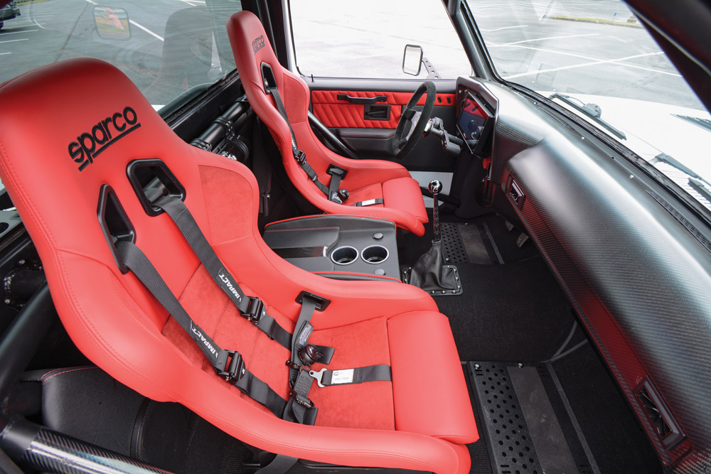 red sparco seats made of leather and suede
