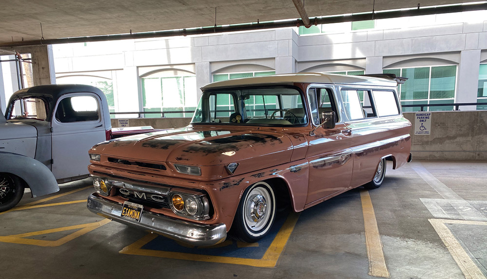 Lowered salmon pink and patina GMC Carryall