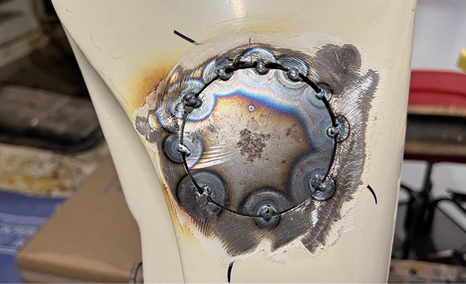 Skipping around the circumference of the tack welds were made in-between the tack welds.