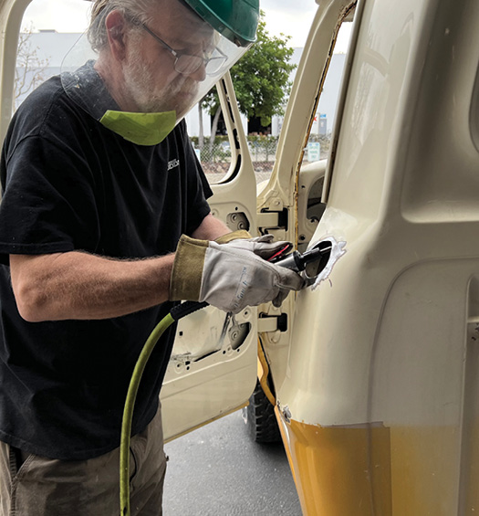 We caught master metalman Kev Elliott plugging the gas filler hole in an F-100. The first step was to remove the paint and taper the edge of the hole for a better weld.
