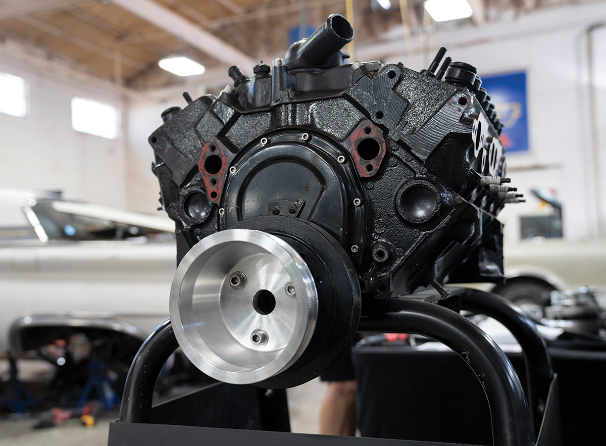 After the prep and fluid removal (both coolant and power steering), begin the front drive installation by attaching the aluminum crank pulley using the supplied socket-head capscrews.