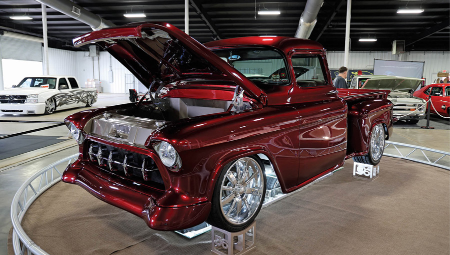 chrome red truck with hood open