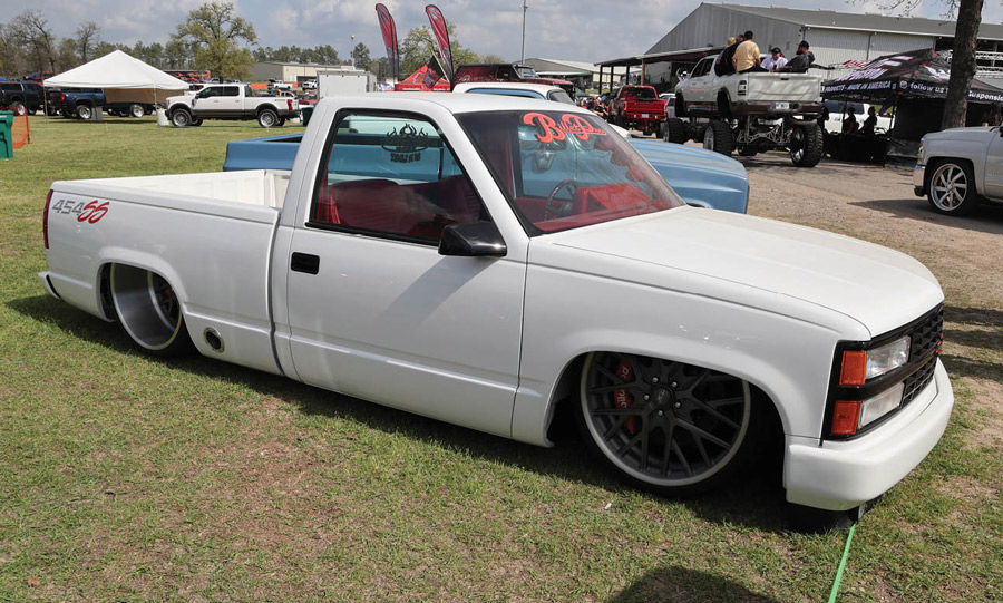 white truck parked on grass