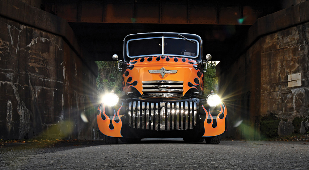 Black '45 Chevy COE with hood and fender flames