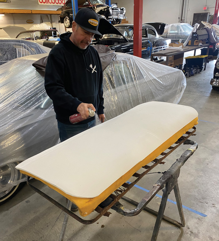 Both sides of the scrim foam (as well as the old foam) were sprayed with 3M’s Super 77—one side to attach and adhere to the base, the other to attach and secure the forthcoming seat pad foam layer (which also received a coat of spray adhesive to the bottom side only). 