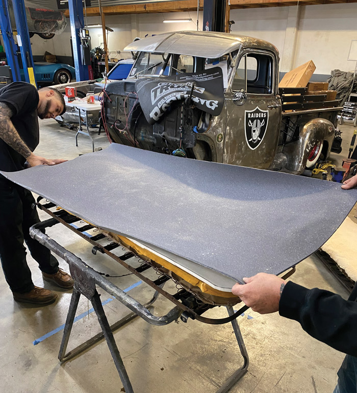 Both sides of the scrim foam (as well as the old foam) were sprayed with 3M’s Super 77—one side to attach and adhere to the base, the other to attach and secure the forthcoming seat pad foam layer (which also received a coat of spray adhesive to the bottom side only). 