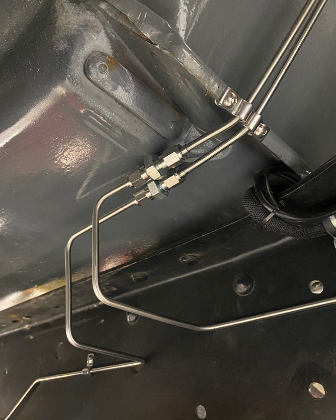 Back under the front of the cab, the brake line for the front brake system has been fabricated and sent toward the front crossmember.