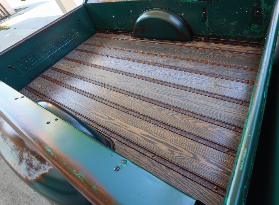 wood panel flooring inside of '53 Chevy trunk