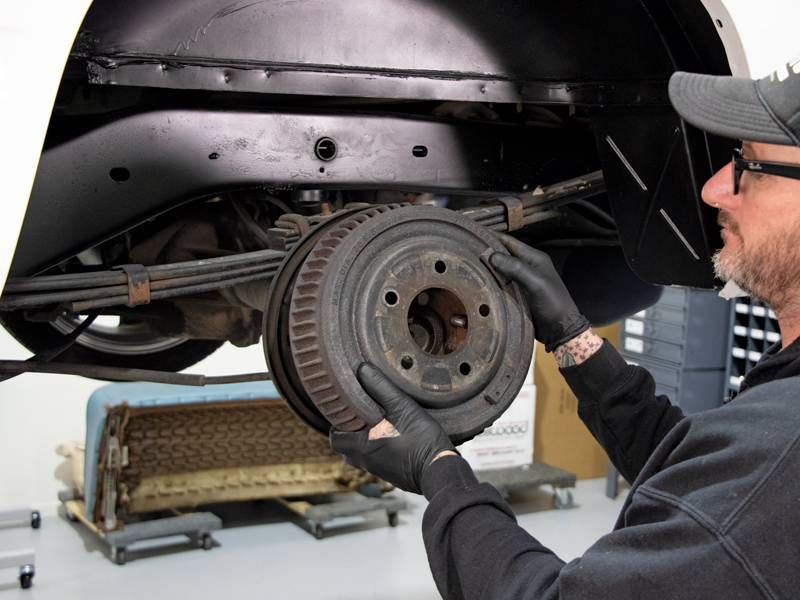 Time to play with drums—as in the rear drum brakes. After pulling off the drum, do yourself a favor and snap a picture or two of the rear brake mechanisms. This could come in very handy as a reference during assembly.