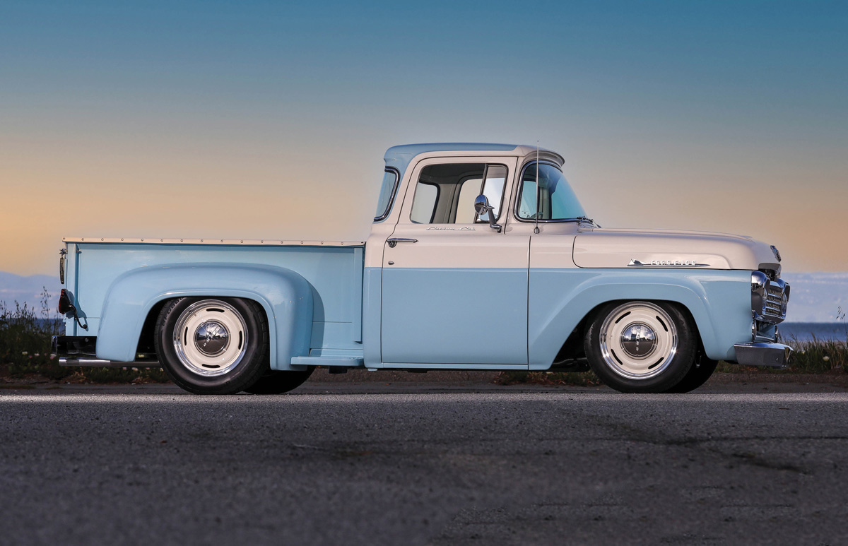 passenger side of a light blue and white '58 Ford F-100