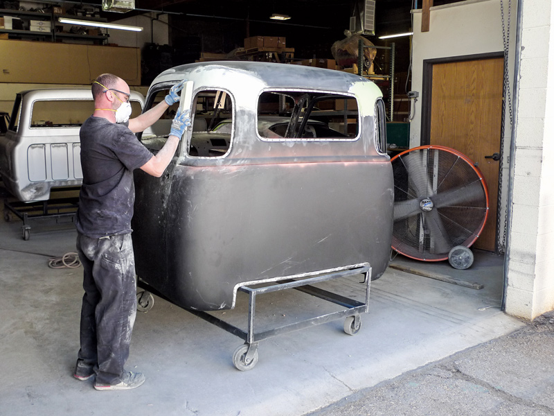 For sanding dust management, finish bodywork takes place in a separate section of the main building. Here a ’47-53 cab receives TLC as its seams are massaged to uniform fairness. Beginning with fiber-reinforced polyester, these panel transitions will be far smoother than the lumpy leaded seams of yore.
