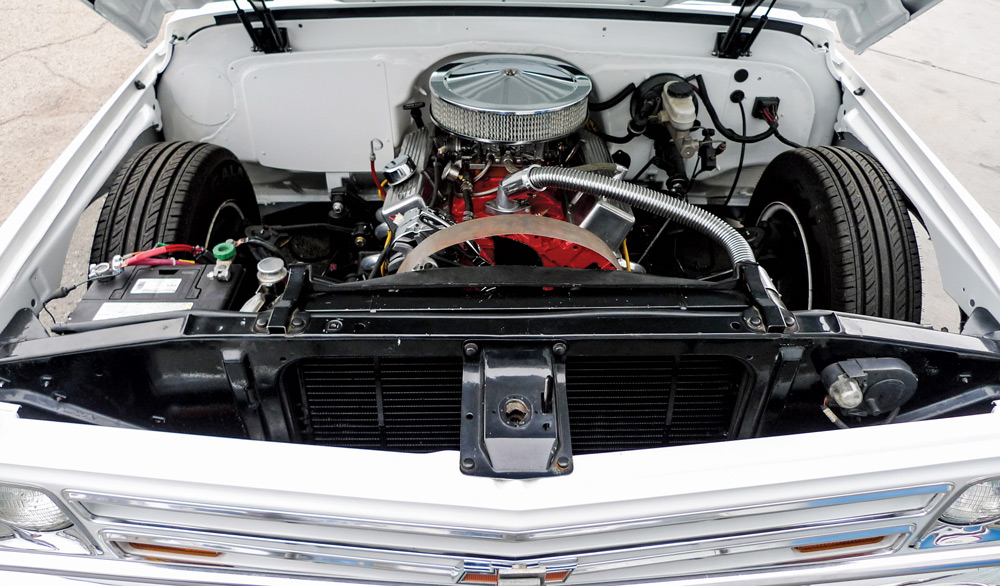 engine of white chevy truck