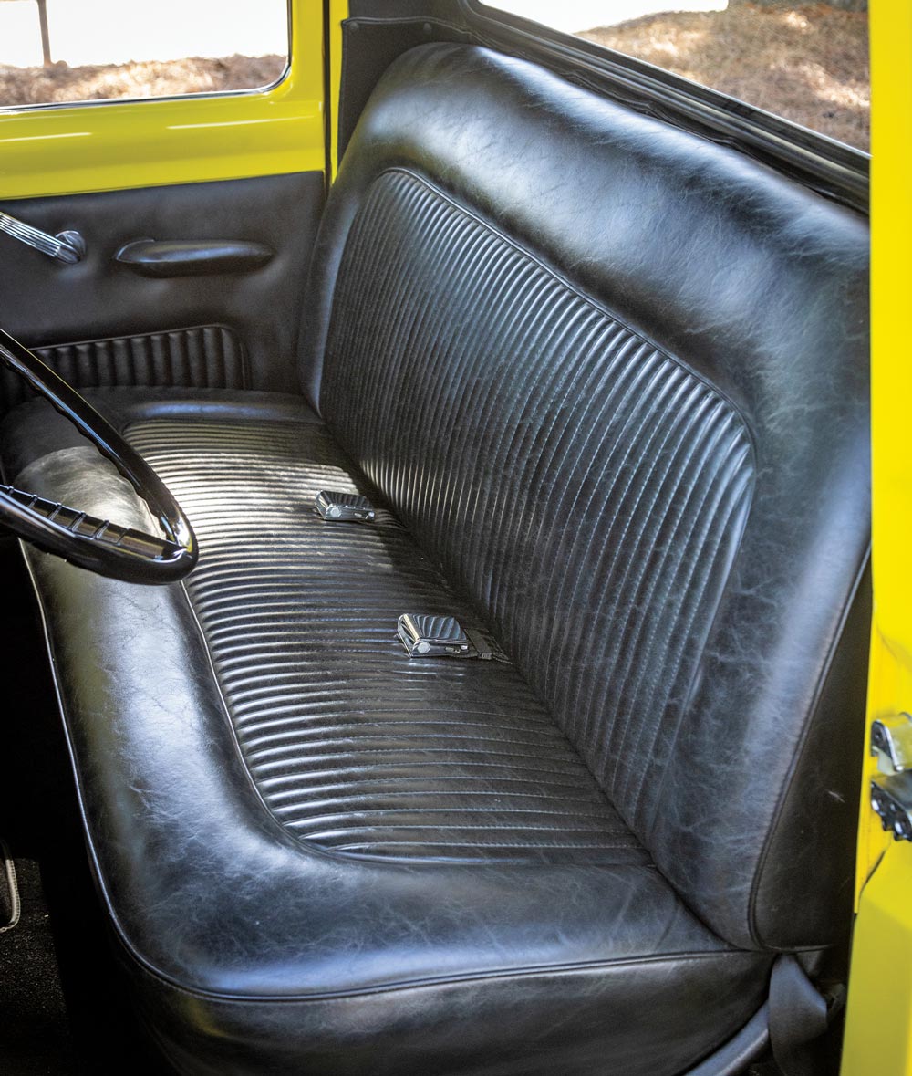 view from the open driver side door of the ’56 Ford F-100 cab seating