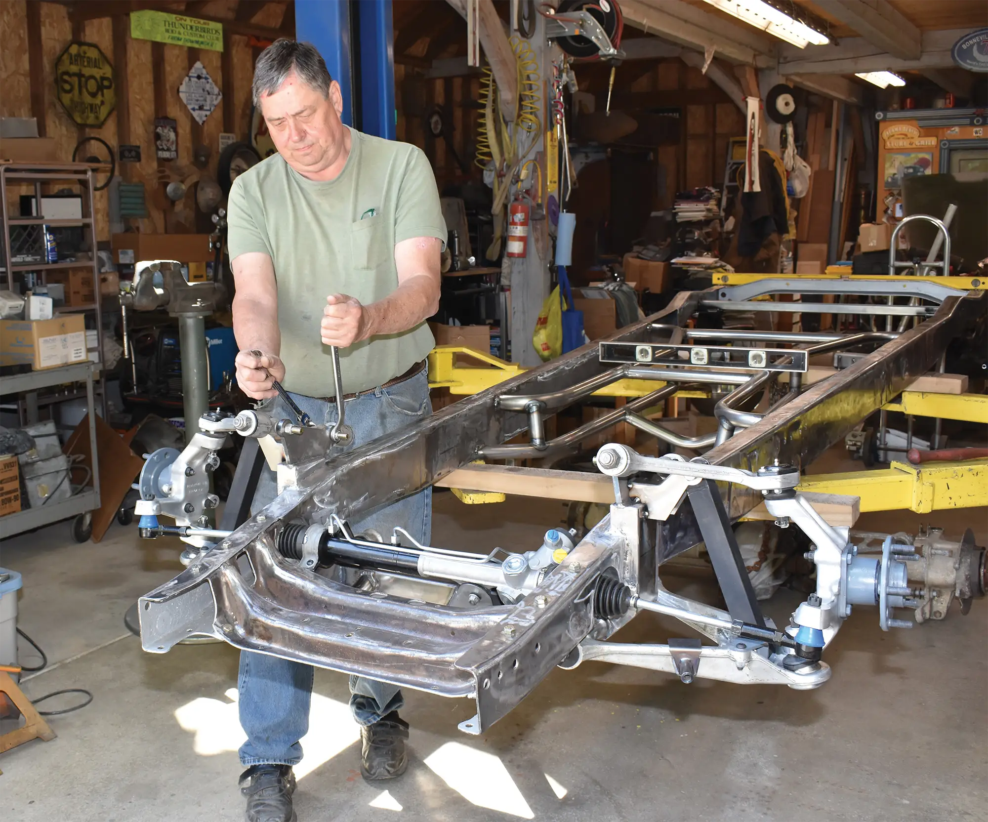 Paul Wilson finishes the preliminary installation of Flat Out Engineering’s Corvette C4 front suspension on his Chevy pickup’s frame. Yet to come are the brakes and the Aldan coilovers.