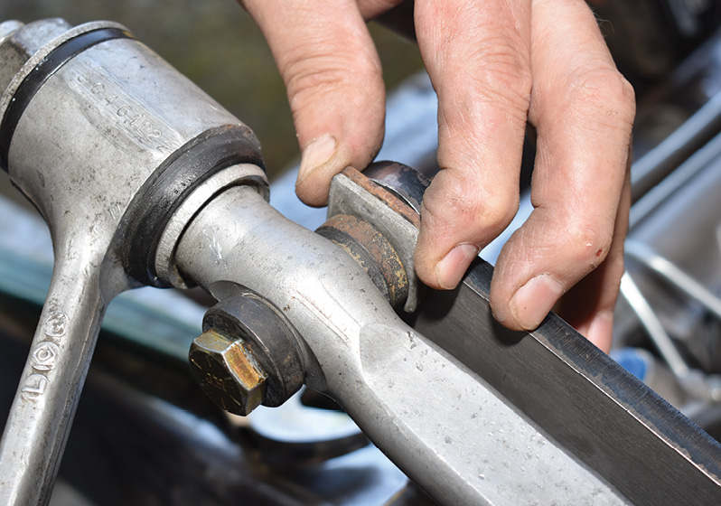 Aligning the front suspension is done with shims between the upper control arm cross shaft and the mount on the Flat Out Engineering crossmember.