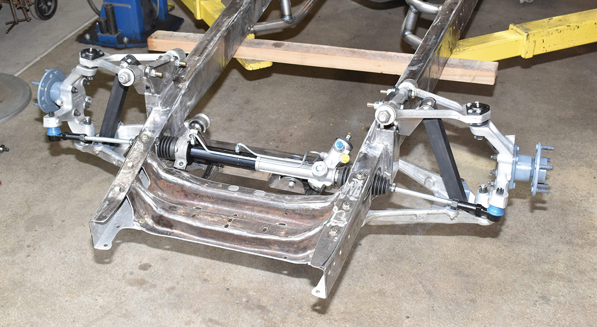 The completed installation is not only clean looking but will provide the smooth ride and outstanding handling these suspensions are known for. Note the temporary struts that hold the suspension at ride height.