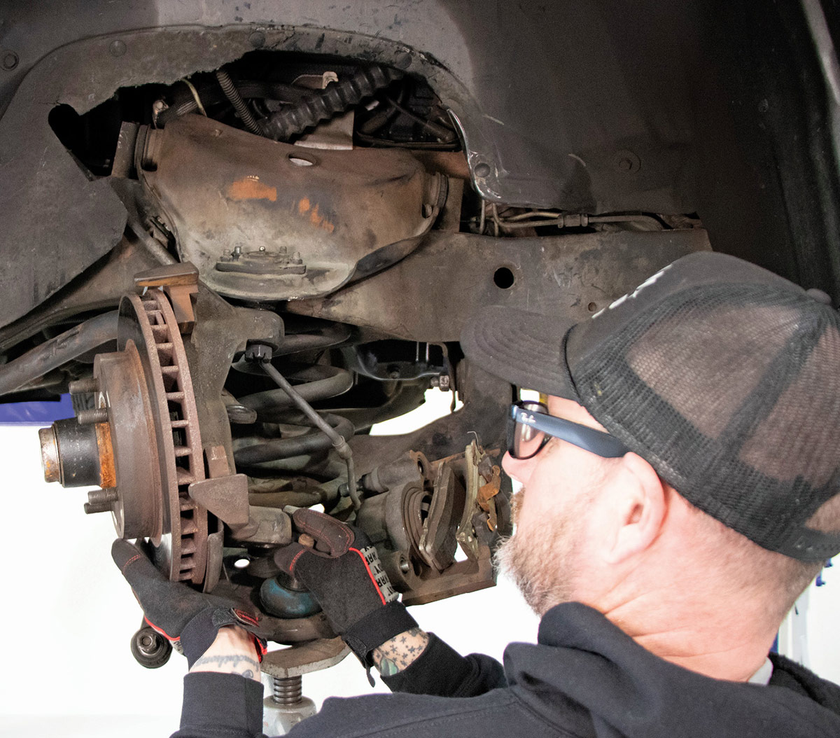 We usually pull the spindle from the lower control arm, followed by the upper connection.