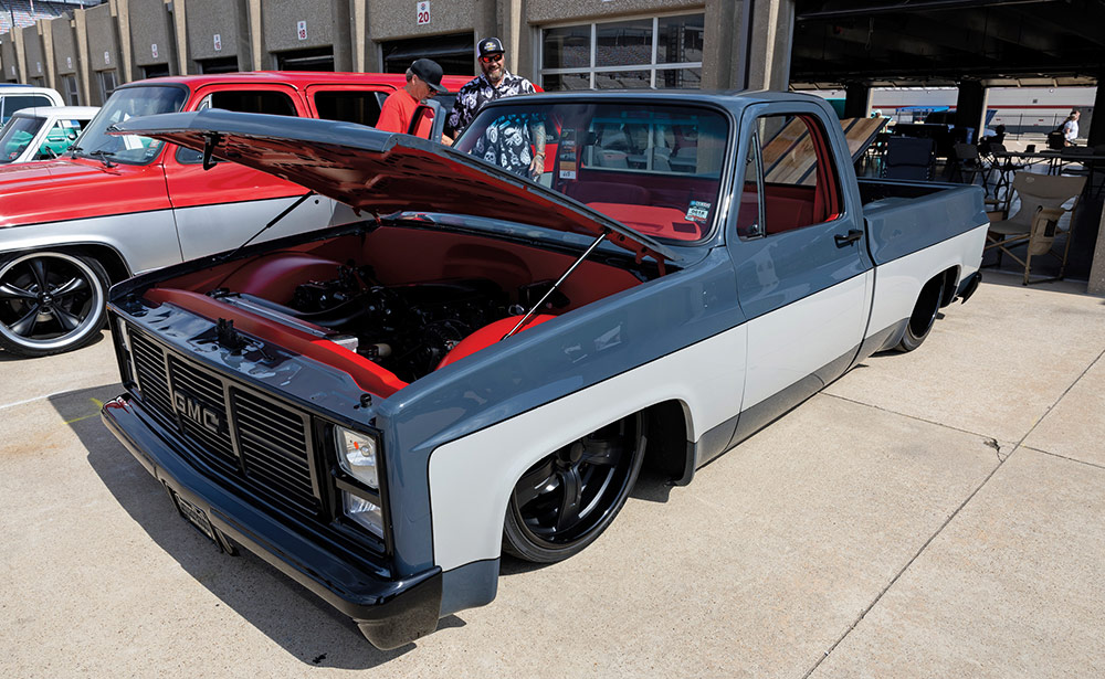Dark steel blue and grayish white lowered Sierra Squarebody