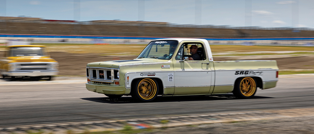 Pale green/yellow and white Sierra Squarebody lapping around track