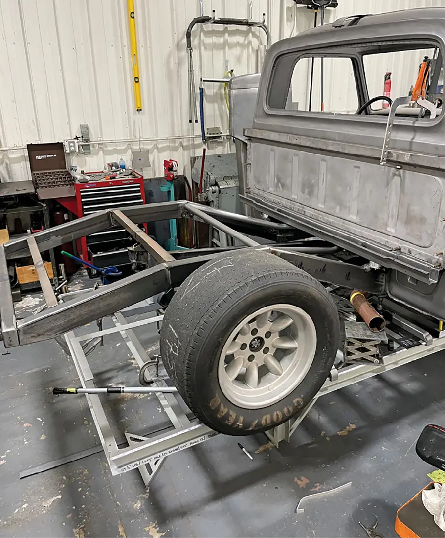 Here is the rear portion of the frame, with the cab location mocked up. There is a straight shot for the exhaust system to run beneath the framerail, headed toward its exit on the side of the bed.