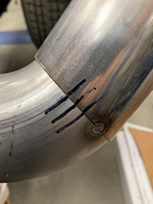 When tacking in place is not possible, this little trick can be used in order to prevent the two sections of tubing from being clocked incorrectly. Marked in place, the two sections can then be transferred to the welding table for tacking.