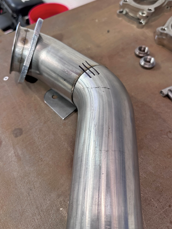 When tacking in place is not possible, this little trick can be used in order to prevent the two sections of tubing from being clocked incorrectly. Marked in place, the two sections can then be transferred to the welding table for tacking.