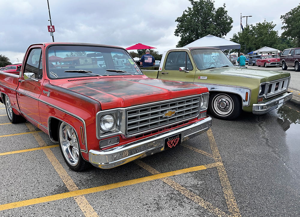 Red Chevy Squarebody next to olive green GMC Squarebody