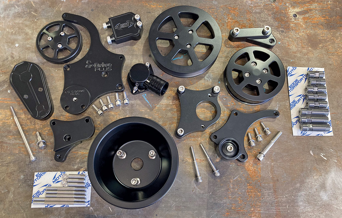 Eddie Motorsports’ (EMS) S-Drive Plus eight-rib serpentine pulley kit pieces lying on the ground