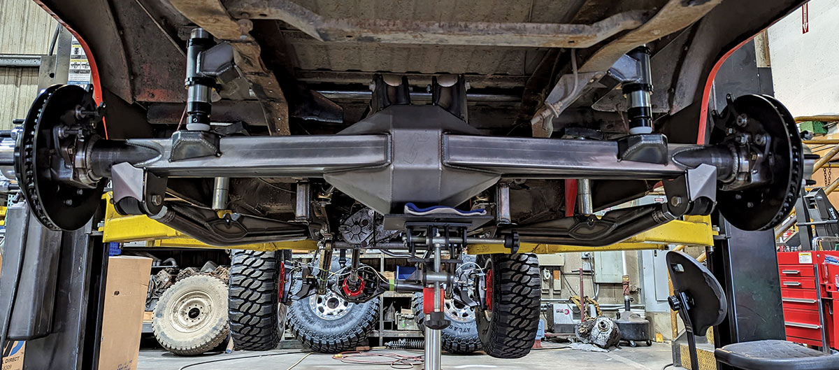 In the rear the fabricated axle housing includes a back brace. Axles are 35-spline full floaters with super-duty hubs.