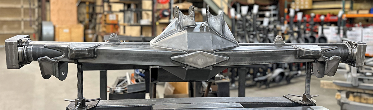 As in the front, the rear 8-lug axle uses a Strange centersection while the remainder of the housing is built in-house at AME.