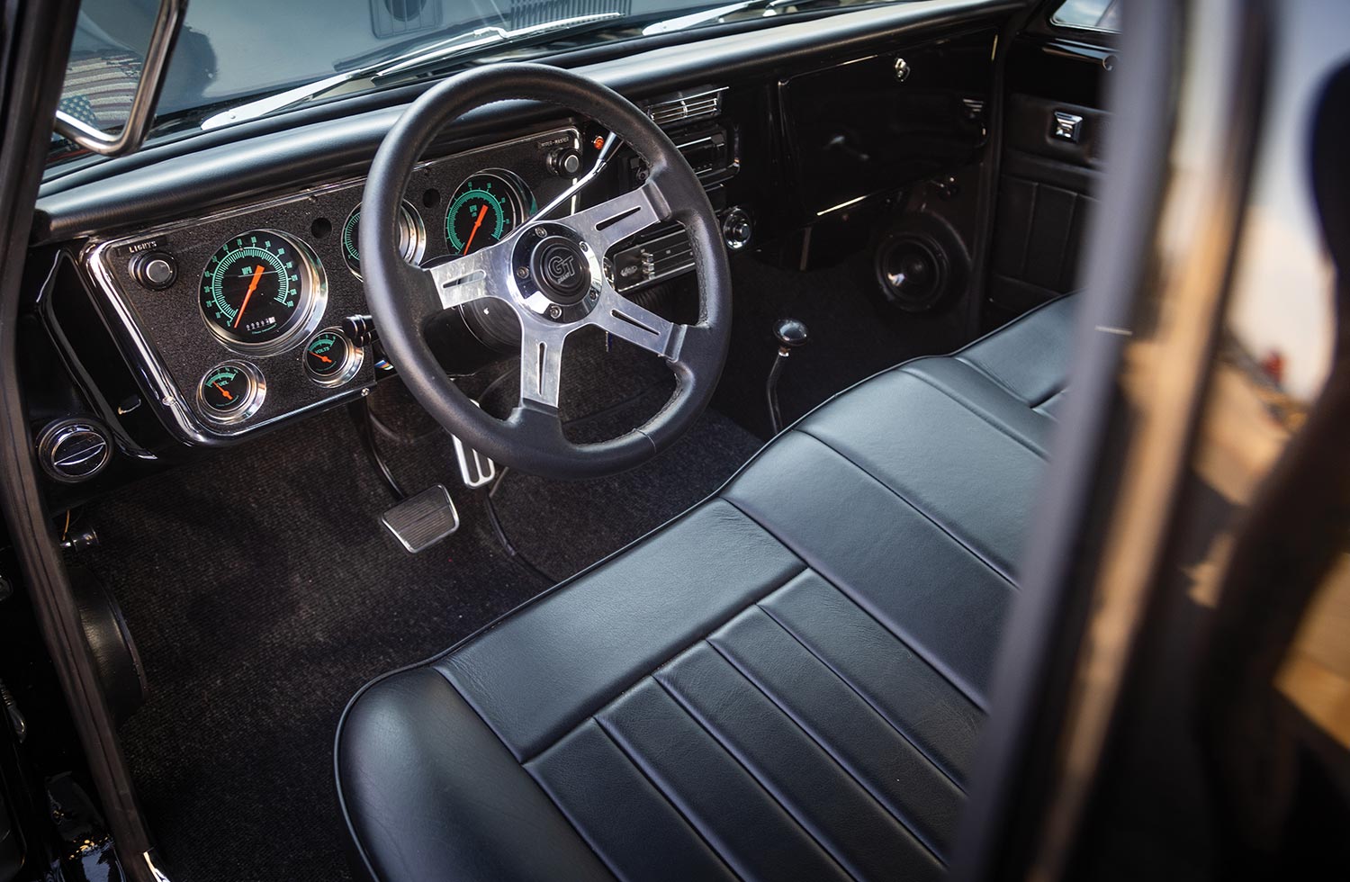 black Chevy K10 steering and driver seating