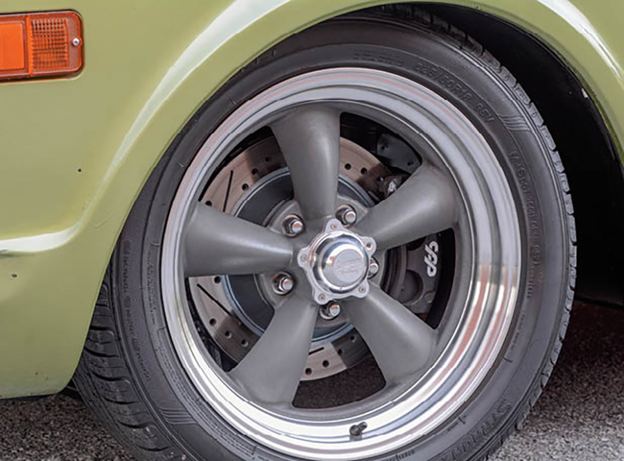 wheel view of green ’71 GMC Stepside
